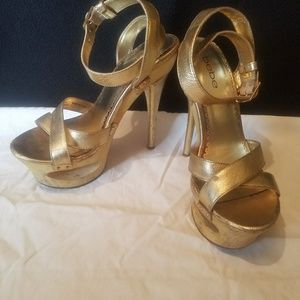 Bebe gold insane wooden heels